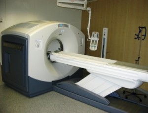 A CT scan machine in a medical examination room.