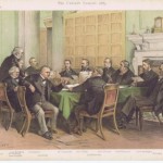 A group of men in suits sit around a table in a formal meeting room with a fireplace.