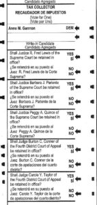 Bilingual ballot listing judicial retention votes with options marked for "YES" or "NO" in English and Spanish.
