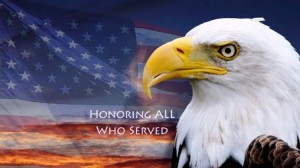 Bald eagle in front of a U.S. flag with the text "Honoring all who served.