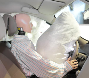 Test dummy in a car after crash-test