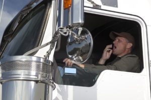 tired truck driving yawning while driving