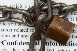 lock and chain in confidential agreement document background