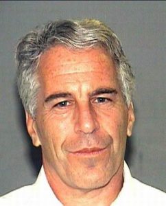 A middle-aged man with gray hair and a neutral expression, facing the camera.