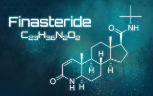 Diagram of finasteride’s chemical structure with its formula: C23H36N2O2 on a blue background.