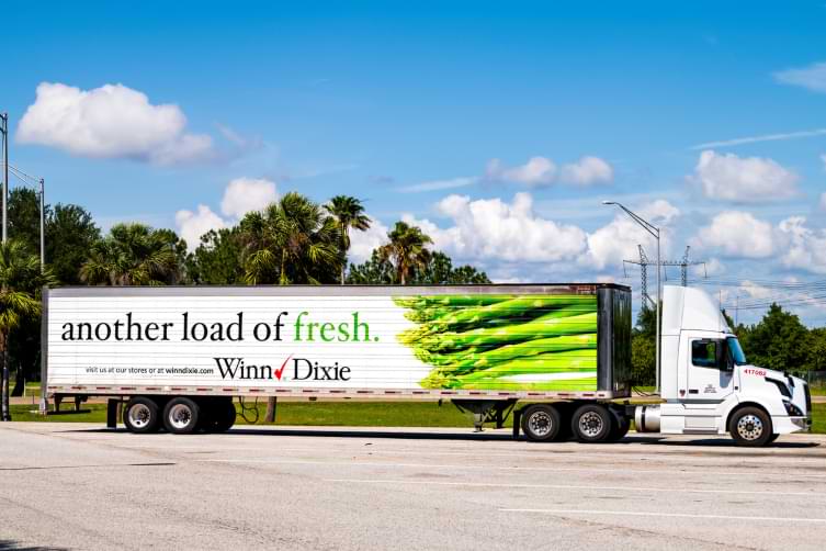 Winn Dixie tractor trailer truck sitting in parking lot of rest area stop on interstate 75 in Tampa Florida 