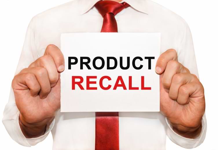 Man holding a card with a text Product Recall